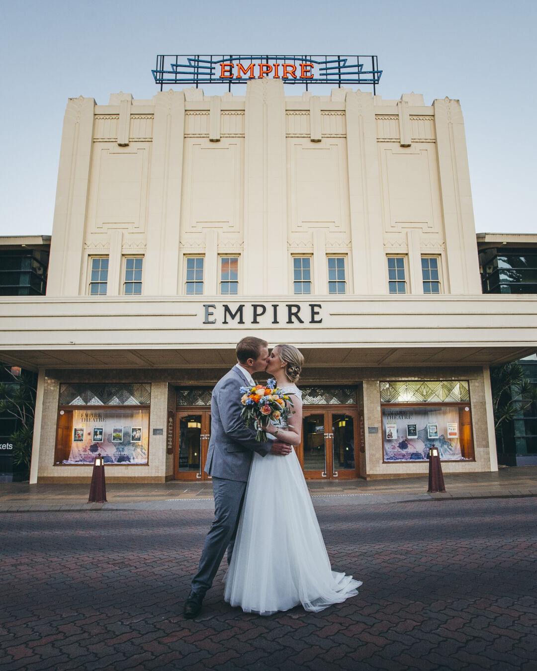 bride and groom outside the empire