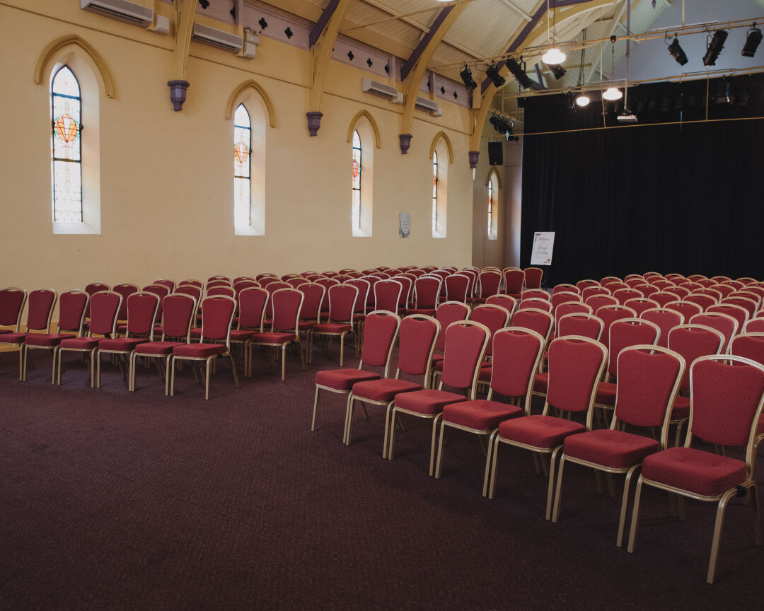 photo of church theatre set up with aisled seating 